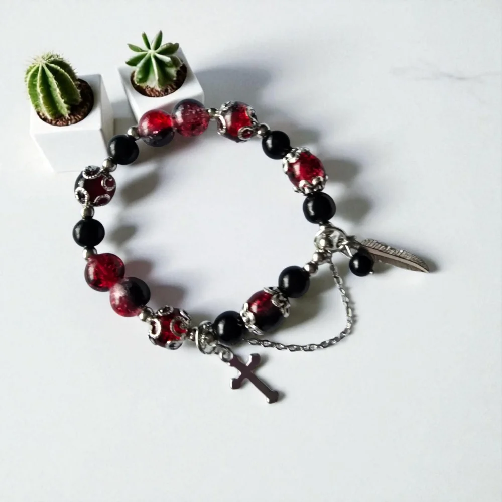 Black and Red Beaded Elastic Bracelet with Silver‎ Charms